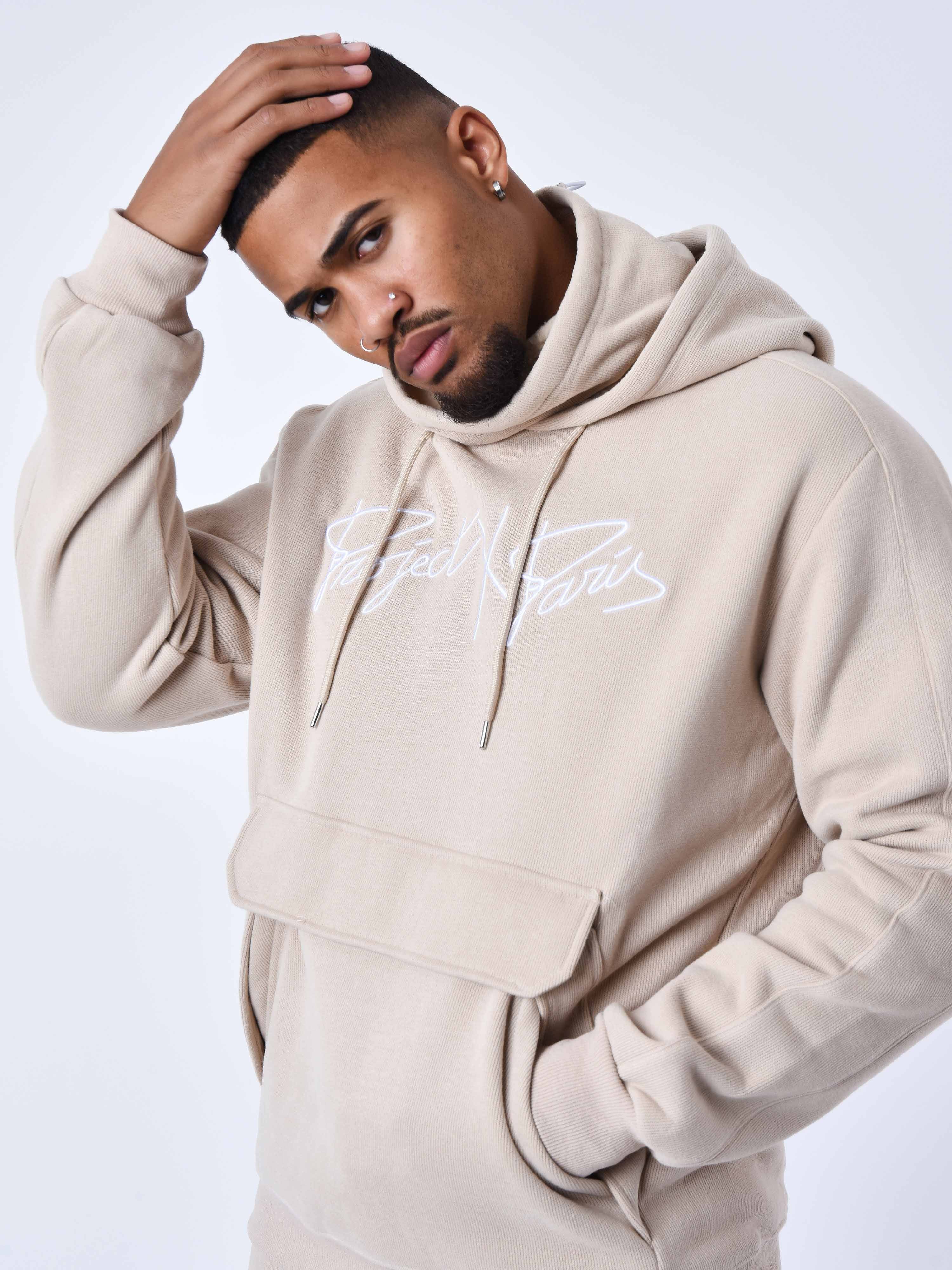 Sweat col roulé à capuche en maille
