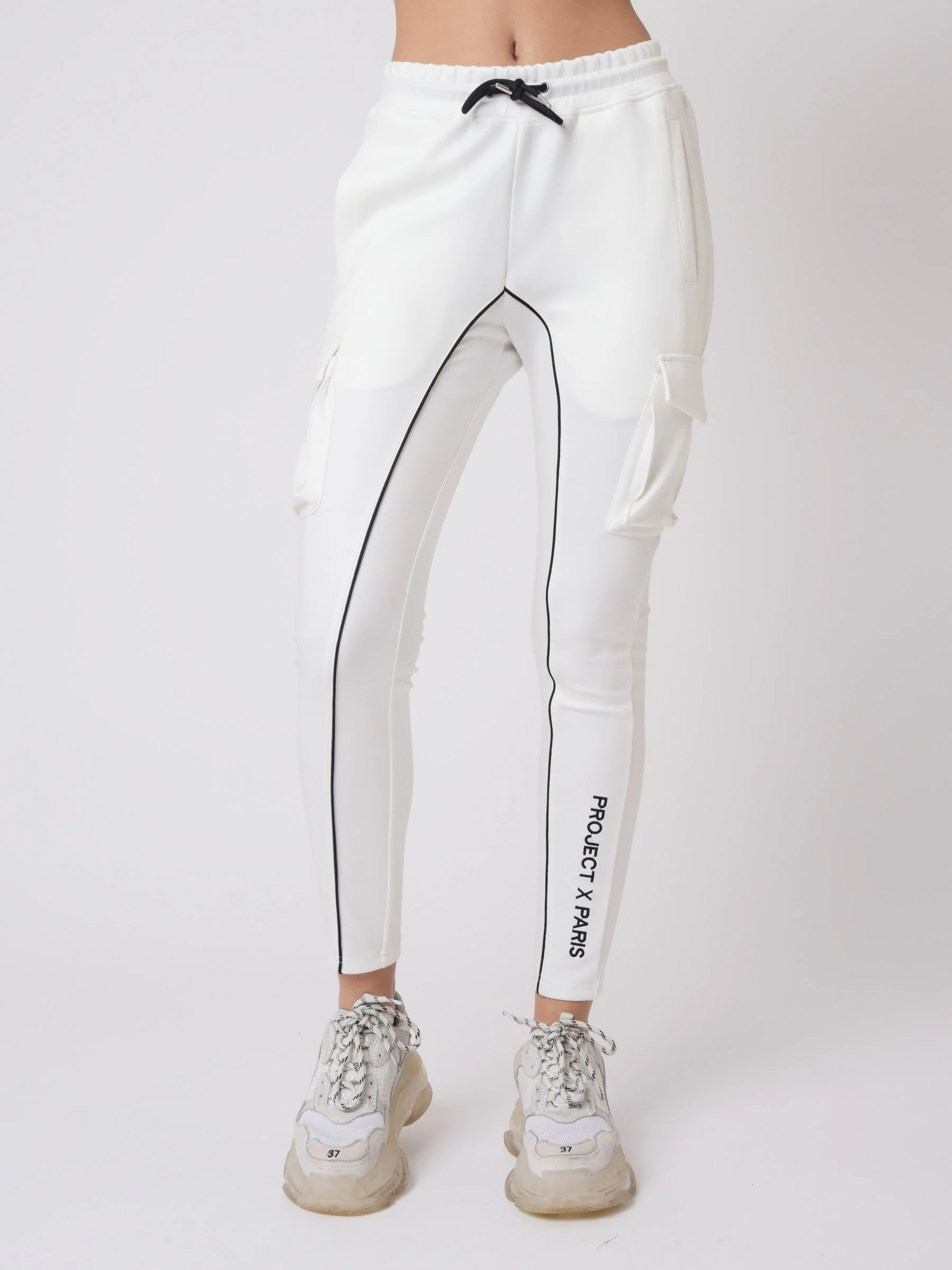 Bas de jogging piping et broderie contrastés simili cuir